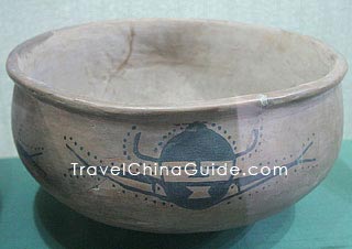 A basin with the pattern of human face and fish, Neolithic Age